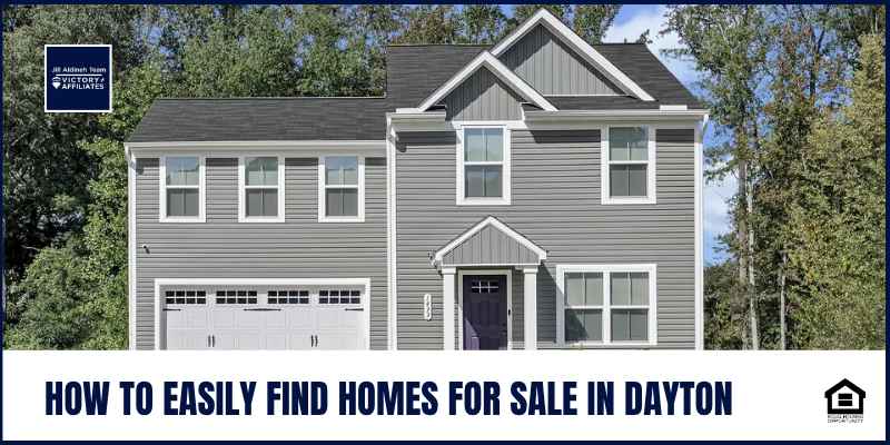 A happy family standing in front of a Dayton home